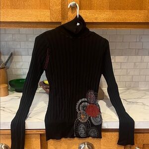 Black Turtleneck Sweater with Embroidered Design